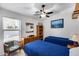 This bedroom features twin beds, natural light, and ample dresser storage at 24204 N 27Th Pl, Phoenix, AZ 85024