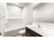 Bathroom featuring a shower/tub combo and a modern vanity with sleek countertops at 25179 W Atlanta Ave, Buckeye, AZ 85326