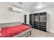 Bedroom featuring a twin bed and a large closet, great for storage at 2812 W Heatherbrae Dr, Phoenix, AZ 85017