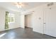 Bright bedroom features tile flooring, a ceiling fan and closet with direct natural light at 3027 N 21St Pl, Phoenix, AZ 85016