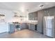 Modern kitchen with stainless steel appliances and custom cabinetry at 3027 N 21St Pl, Phoenix, AZ 85016