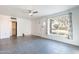 Bright living room with a ceiling fan and tiled floors at 3027 N 21St Pl, Phoenix, AZ 85016