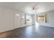 Open living room featuring a ceiling fan and tiled floors at 3027 N 21St Pl, Phoenix, AZ 85016