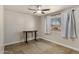 Bright bedroom with natural light, neutral walls and a simple desk setup, perfect for a home office at 3031 S Los Altos --, Mesa, AZ 85202