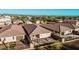 An aerial shot capturing a home's outdoor amenities, including a patio and a pool at 30816 N 138Th Ave, Peoria, AZ 85383