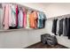 Walk-in closet with an ample storage space and wood floor at 30816 N 138Th Ave, Peoria, AZ 85383