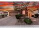 Charming single-story home with stone accents, desert landscaping, and a two-car garage at 30816 N 138Th Ave, Peoria, AZ 85383