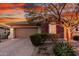 Charming single-story home with stone accents, desert landscaping, and a two-car garage at 30816 N 138Th Ave, Peoria, AZ 85383