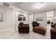 Spacious living area with decorative columns, neutral tones, and stylish furnishings at 30816 N 138Th Ave, Peoria, AZ 85383