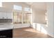 Bright and open kitchen area features plenty of natural light and stylish decor at 3144 E Desert Broom Way, Phoenix, AZ 85048