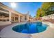 Backyard pool with patio, landscaping, and blue skies at 3144 E Desert Broom Way, Phoenix, AZ 85048