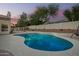 Inviting pool with lush landscaping, perfect for relaxation and entertaining at 3144 E Desert Broom Way, Phoenix, AZ 85048