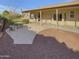 Covered outdoor patio area with stone seating, perfect for outdoor relaxation at 3313 N Lakeshore Ct, Avondale, AZ 85392