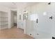 A bright white bathroom features a glass enclosed shower, and dual sink vanity at 3557 S Halsted Ct, Chandler, AZ 85286