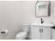 A powder room with white vanity and modern fixtures at 3557 S Halsted Ct, Chandler, AZ 85286