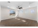 Bright bedroom featuring a modern ceiling fan and multiple windows for natural light at 3557 S Halsted Ct, Chandler, AZ 85286