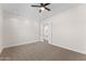 Bedroom with neutral carpet and white trim opens to living space at 3557 S Halsted Ct, Chandler, AZ 85286