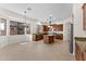 View of the kitchen with tile floors, an island, and granite countertops at 3557 S Halsted Ct, Chandler, AZ 85286