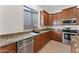 The kitchen features granite countertops and stainless steel appliances at 3557 S Halsted Ct, Chandler, AZ 85286