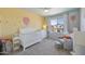 Bright Bedroom with white furniture, soft carpet, and a colorful balloon-themed wall mural at 4439 E Coyote Wash Dr, Cave Creek, AZ 85331