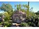 Jasmine Trails II community sign surrounded by lush desert landscaping at 4439 E Coyote Wash Dr, Cave Creek, AZ 85331