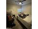 Bedroom with a ceiling fan and natural light from the window at 501 S 98Th St, Mesa, AZ 85208