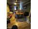 Bright dining room featuring a vintage table, wood floors, and lots of natural light at 501 S 98Th St, Mesa, AZ 85208