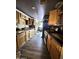 Kitchen with wood cabinets and a view to dining area at 501 S 98Th St, Mesa, AZ 85208