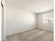 Neutral bedroom with carpet, white walls, and a window with blinds at 5055 S 251St Dr, Buckeye, AZ 85326