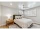 Cozy bedroom features bright, neutral decor, recessed lighting, and shuttered windows at 5201 N 33Rd St, Phoenix, AZ 85018