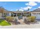 Inviting front entrance featuring a charming outdoor seating area, beautiful landscaping, and a welcoming front door at 5201 N 33Rd St, Phoenix, AZ 85018