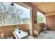 Cozy balcony featuring string lights, seating, and views of the neighborhood, creating a tranquil outdoor space at 540 N May -- # 2151, Mesa, AZ 85201