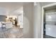 Open-concept dining area next to a modern kitchen, seamlessly connected to a laundry closet at 540 N May -- # 2151, Mesa, AZ 85201