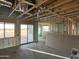 Home under construction shows interior framing, insulation, ductwork, with outdoor views at 5893 N Nigal Rd, Casa Grande, AZ 85194