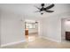 Inviting living area showcasing tile flooring, open layout, and seamless transition to the adjacent spaces at 5902 W Wolf St, Phoenix, AZ 85033