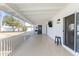 Back patio with barbecue and outdoor television at 718 W Vine Ave, Mesa, AZ 85210