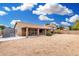 Backyard featuring a shed and a covered patio, perfect for storage and relaxing at 7214 W Crest Ln, Glendale, AZ 85310