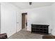 Minimalist bedroom featuring a closet, a dresser, carpet floors and white walls at 7214 W Crest Ln, Glendale, AZ 85310