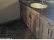 Bathroom vanity with ample cabinet storage space and a light colored counter at 723 E Garnet Ave, Mesa, AZ 85204