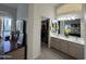 Bathroom boasts a double sink vanity, walk-in closet, and bright natural light at 8199 E Sweet Acacia Dr, Gold Canyon, AZ 85118