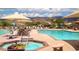 Community pool and spa area with comfortable seating and desert scenery at 8199 E Sweet Acacia Dr, Gold Canyon, AZ 85118