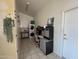 Laundry room featuring washer and dryer, workspace and ample storage at 8199 E Sweet Acacia Dr, Gold Canyon, AZ 85118