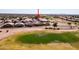 Aerial view of property in a golf community with mountain views at 8212 E Masters Rd, Gold Canyon, AZ 85118