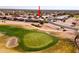 Aerial view of property in golf community with mountain views at 8212 E Masters Rd, Gold Canyon, AZ 85118