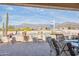 Back patio featuring patio table and seating with mountain views in the background at 8212 E Masters Rd, Gold Canyon, AZ 85118