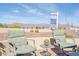 Back patio view featuring outdoor seating with mountain views in the background at 8212 E Masters Rd, Gold Canyon, AZ 85118