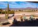 Desert backyard showcasing landscape, hardscape, and mountain views at 8212 E Masters Rd, Gold Canyon, AZ 85118