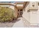 Inviting front entrance with desert landscaping, a tiled roof, and a charming pathway leading to the front door at 8212 E Masters Rd, Gold Canyon, AZ 85118