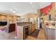 Open-concept kitchen with a wine fridge, stainless steel appliances, and a smooth transition into the living area at 8212 E Masters Rd, Gold Canyon, AZ 85118