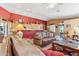 Cozy living room featuring comfortable leather sofas and an open floor plan at 8212 E Masters Rd, Gold Canyon, AZ 85118